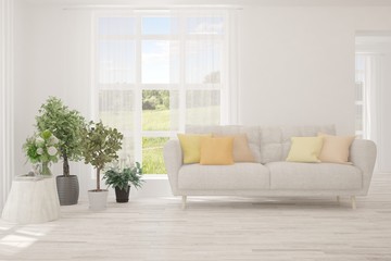 Fototapeta premium Stylish room in white color with sofa. Scandinavian interior design. 3D illustration