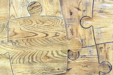 Wooden puzzles. Puzzles from a parquet board.