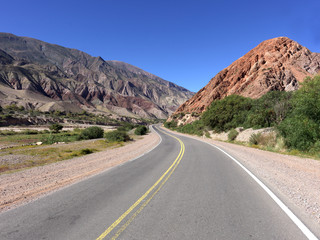Quebrada de Humahuaca. The  Hill of the Seven Colours shows its colourful face. The name of the town can be interpreted as the combination of Aymara language words purma (desert) and marca(city)