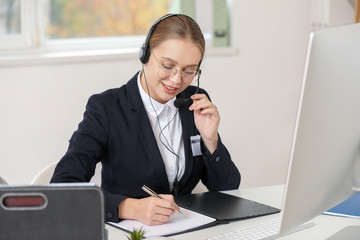 Female secretary working in office