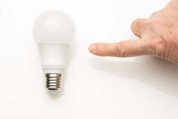 Energy saving light bulb and white color, daylight
