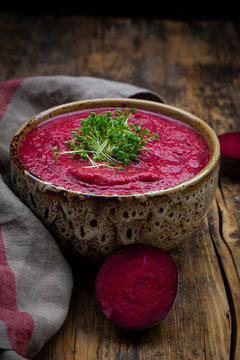 Bowl of vegan borscht with cress topping