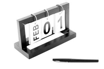 February 1st calendar icon. Day 1 of month. Office background.