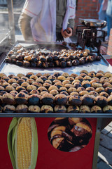 Traditional street food grilled chesnuts