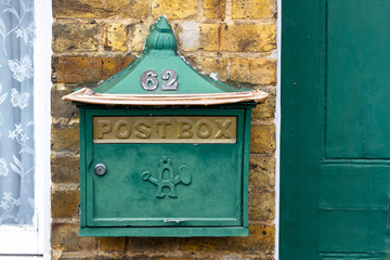 Traditional green postbox in Britain