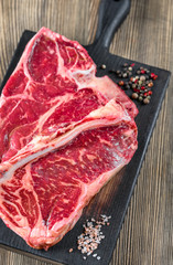 T-bone steak on the wooden board