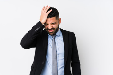 Young latin business woman against a white background isolated forgetting something, slapping forehead with palm and closing eyes.