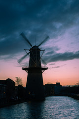 Beautiful windmills in Schiedam province South Holland, these highest windmills in the world also known as burner mills were used for grinding grain that was used for the gin industry. 