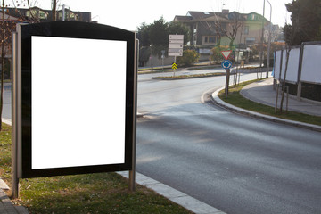 advertising board on asphalt road