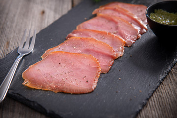 Tasty cold smoked tuna slices