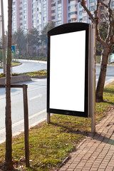 advertising board on asphalt road