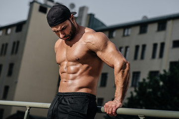 Sexy athlete sucks and poses topless. Europe.