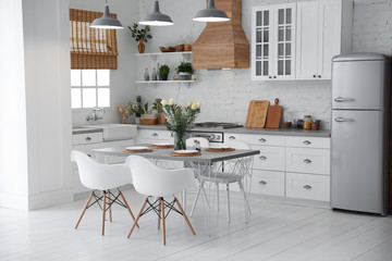 Beautiful kitchen interior with new stylish furniture - 319538012