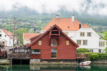 Typical Norwegian wooden houses on the shores of the lake that bathes Stryn Norway