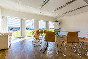 Portait of business people with tablet pc at the conference room