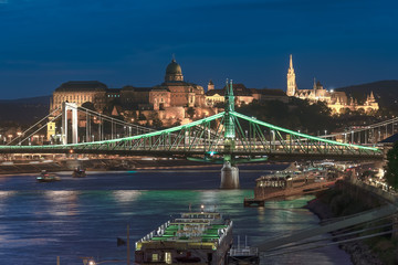 Europe Hungary night cityscape. Elizabeth bridge. Liberty bridge. Buda castle. Tower of Matthias church. Danube river. River bank. dock. boats. night. Fishermans bastion