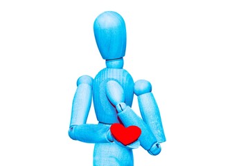 Wooden dummy holds a red heart. Valentine's day concept. Concept of protecting health from heart disease.