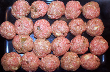 Homemade meatballs made with lean ground beef and spices ready for cooking