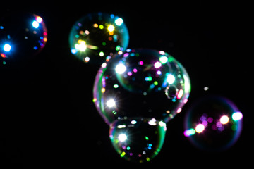 Soap bubbles on a dark background