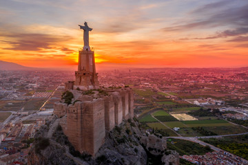 Monteagudo medieval castle ruin twelve rectangular towers circling the hilltop and the sacred heart...
