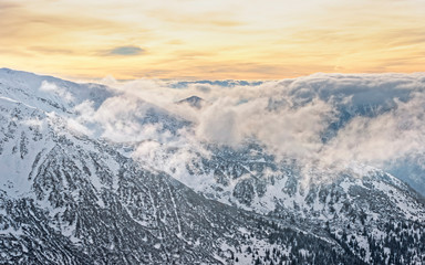 Cloud and sun in Kasprowy Wierch in Zakopane in Tatras in winter. Zakopane is a town in Poland in Tatra Mountains. Kasprowy Wierch is a mountain in Zakopane and is the most popular ski area in Poland
