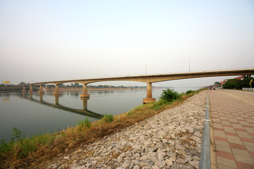 Fototapeta premium Udon Thani,Thailand-January 23, 2020: First Thai–Lao Friendship Bridge viewed from Nong Khai, Thailand