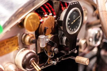 instrument gauge cluster on dashboard of classic car