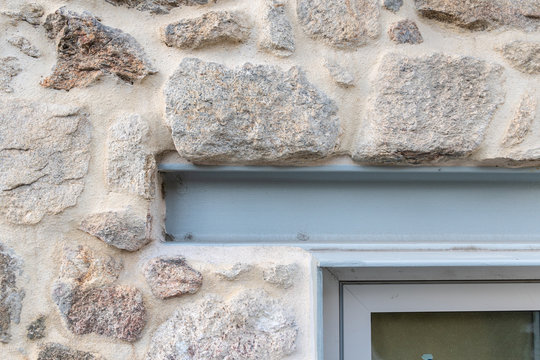 Detail of iron beam acting as window lintel. Rehabilitation of old buildings with present materials