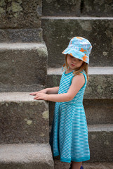 young girl at Miyajima Island visiting deer