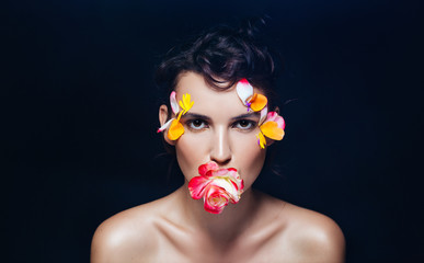 beauty woman on black with makeup and flower