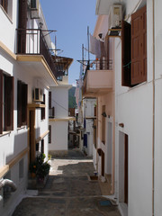 Fototapeta na wymiar Walk through the streets of the old town of Skopelos, Greece