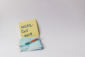 New Coronavirus-2019-nСoV, Wuhan virus concept. Explanation of the designation of Coronovirus. Protective masks and a thermometer to detect fever and isolate patients. Chinese outbreak of coronavirus.