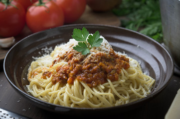 tomato sauce bolognese spaghetti with grated cheese