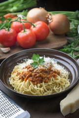 tomato sauce bolognese spaghetti with grated cheese