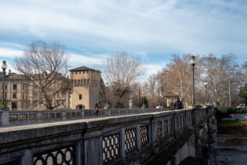 Fototapeta na wymiar parma view of Ponte Giuseppe Verdi with people walking