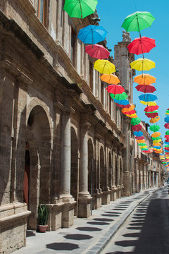 Licata street decorated with umbrella. Sicily, Italy