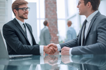 close up. business handshake at the negotiating table