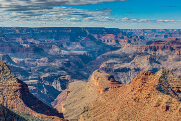 Panoramic view from south cliff of Grand Canyon with dramatic cloud formations in winter