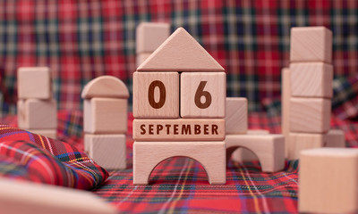 September 6 written with wooden blocks