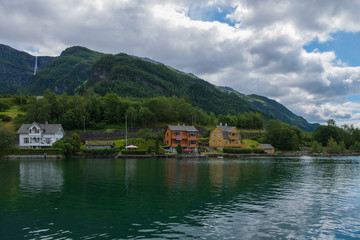 Fototapeta premium Norway fiord Ullensvang village - part of Hardanger Fjord called Sorfjord. Morning view. July 2019