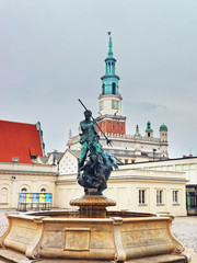 Obraz premium Neptune fountain at Old Market Square in the city center in Poznan, Poland.