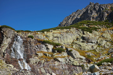 Beautiful waterfall Skok  near to Strbske Pleso in the High Tatras mountain in Slovakia © andras_csontos