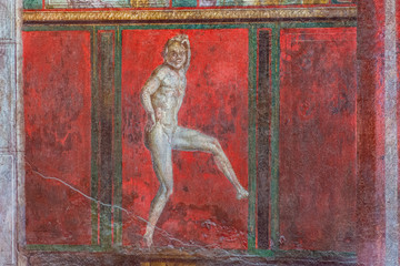 Italy, Pompeii, archaeological area, remains of the city buried by the eruption of ashes and rocks of Vesuvius in 79. Remains of the frescoes in the Villa of Mysteries