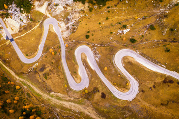 Drone aerial view - windy road in autumn