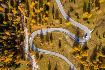 Drone aerial view - windy road in autumn