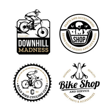 Set of vector black, gold and white bike shop, bicycle service, mountain and road biking clubs and adventures badges
