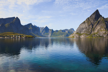 Typical Lofoten landscape view of the mountain by the sea near Reine, Norway.