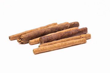 Close up Cuban cigarillo and cigars on white background.