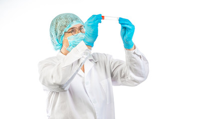 lab technician looks at a test tube of clear liquid, coronavirus