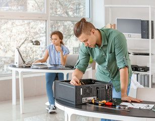 Electronic technicians working in service center